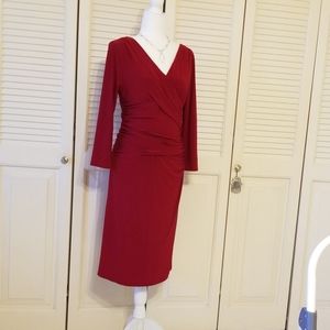 A  v neck long sleeve dress by Carmen Marc Valvo